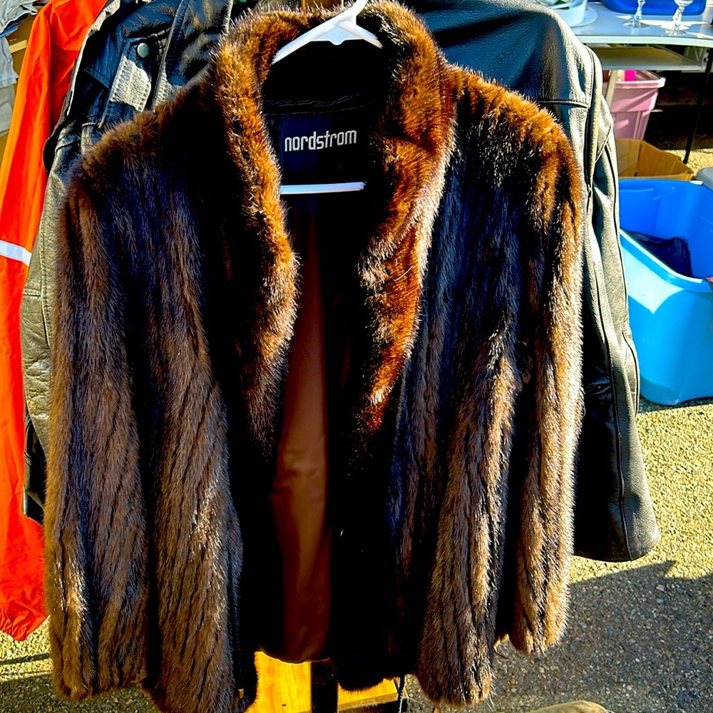 Beautiful ladies black mink fur coat from Nordstrom’s.Size medium to large.